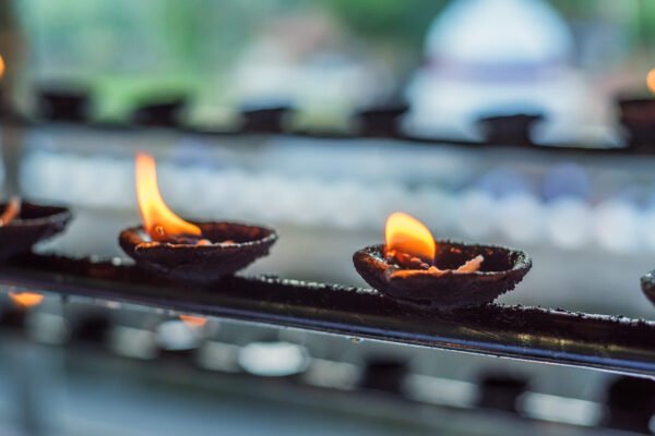 Coconut oil lamps in temple 2 Important Questions
